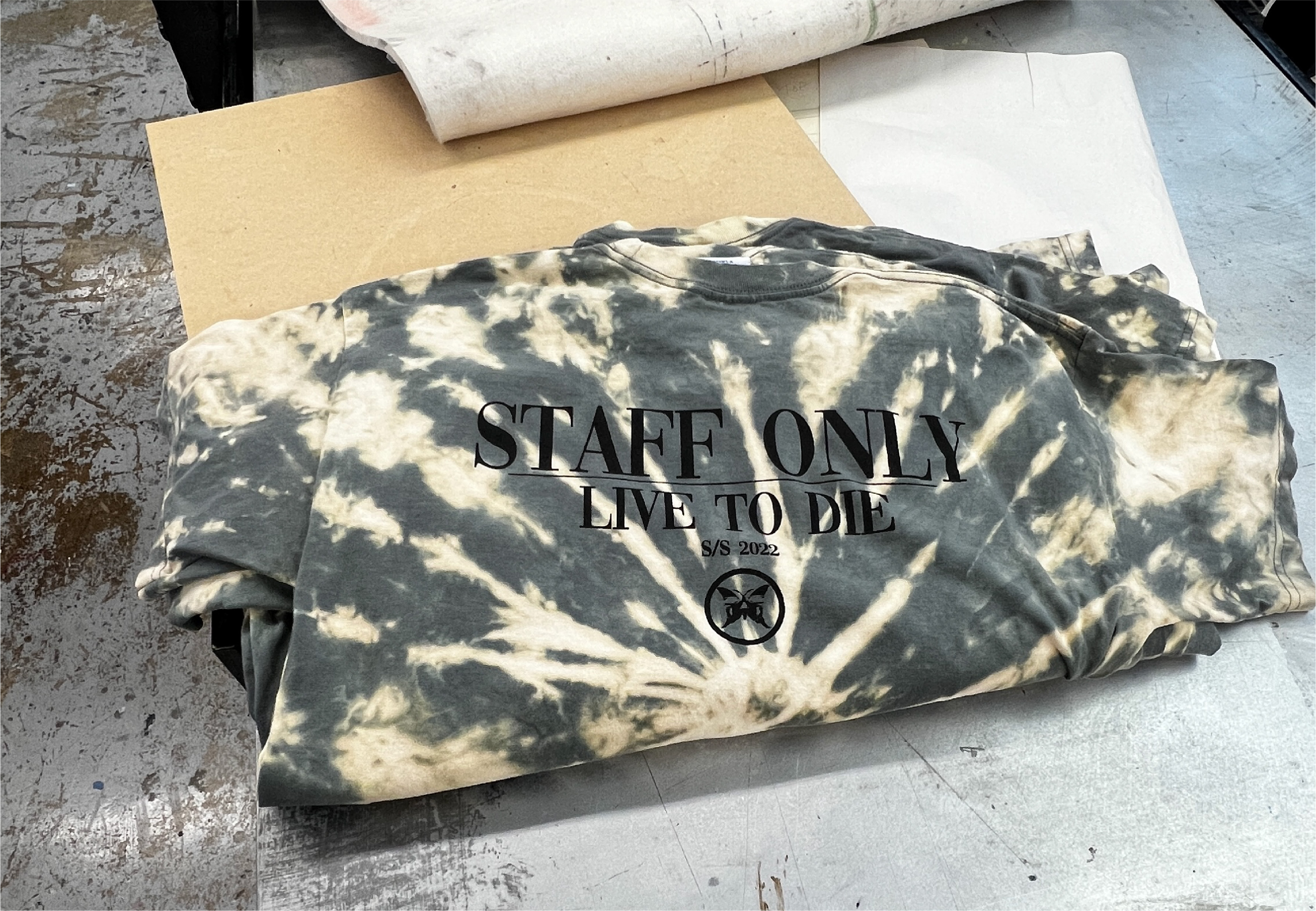 Stack of dyed Live to Die production shirts