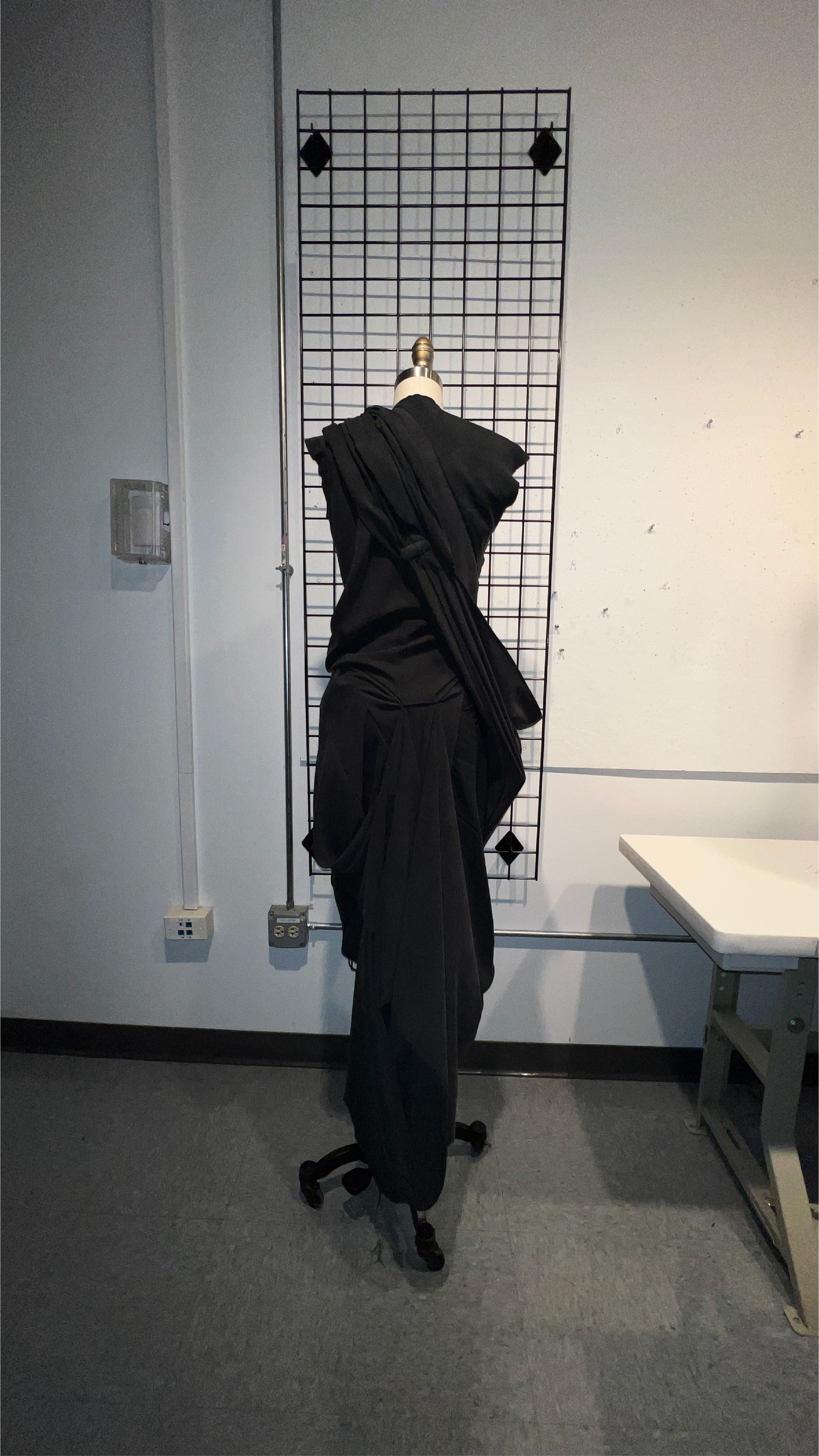 Final subtraction-cut garment, back view